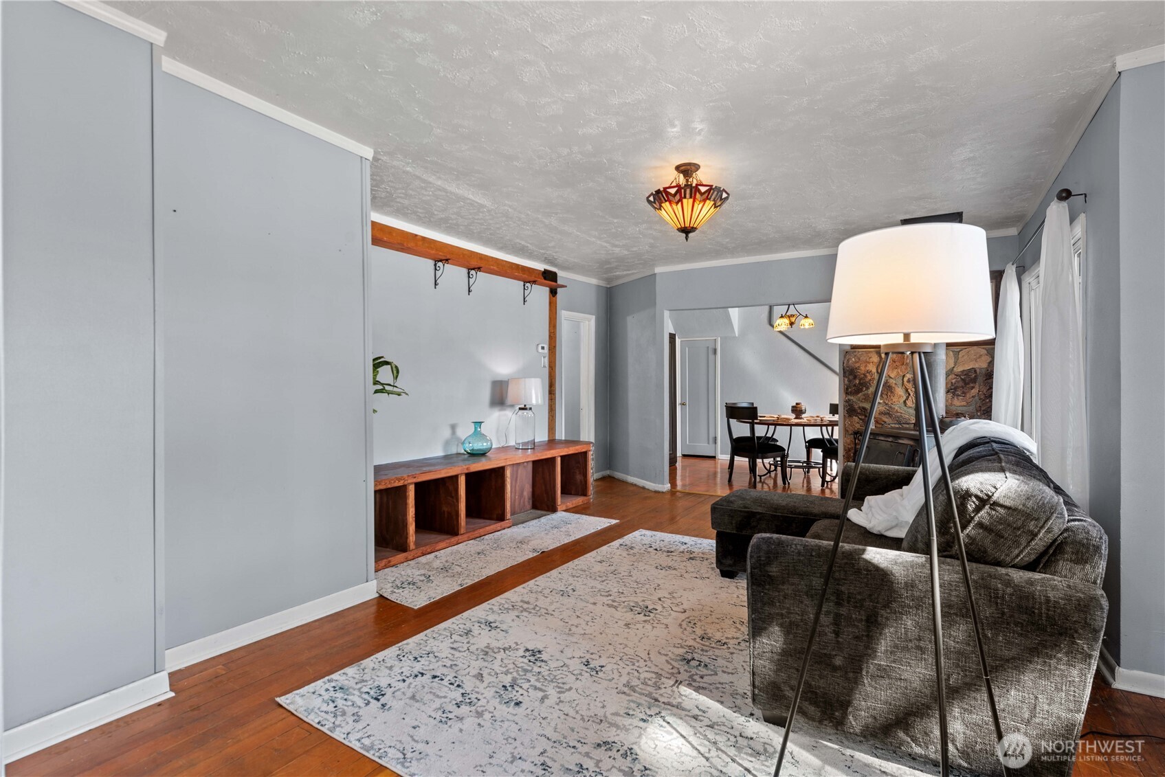22 South Emerson Avenue Wenatchee, WA 98801 - Photo 2 of 38 a living room with furniture and a wooden floor