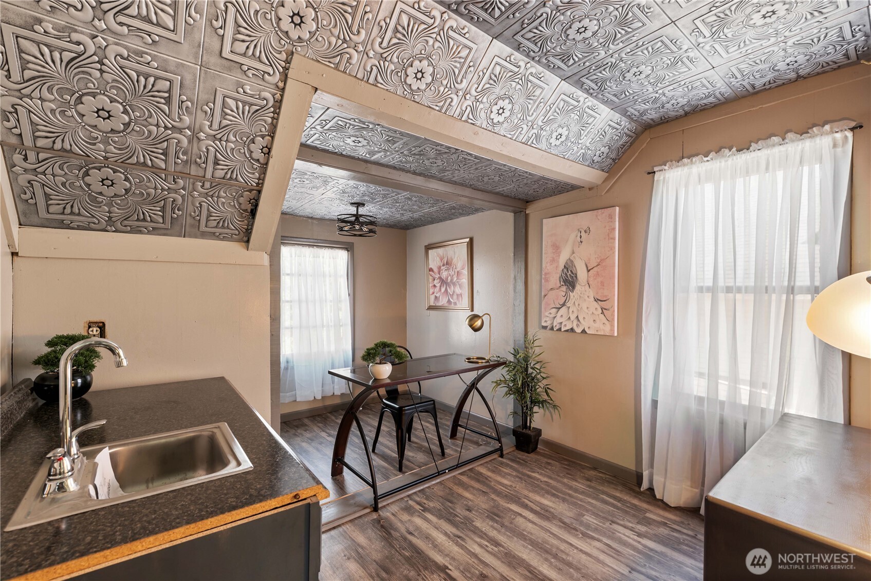 22 South Emerson Avenue Wenatchee, WA 98801 - Photo 28 of 38 a view of a dining room with furniture and wooden floor