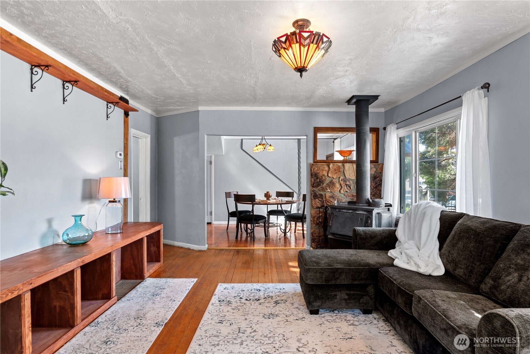 22 South Emerson Avenue Wenatchee, WA 98801 - Photo 3 of 38 a living room with furniture and a large window