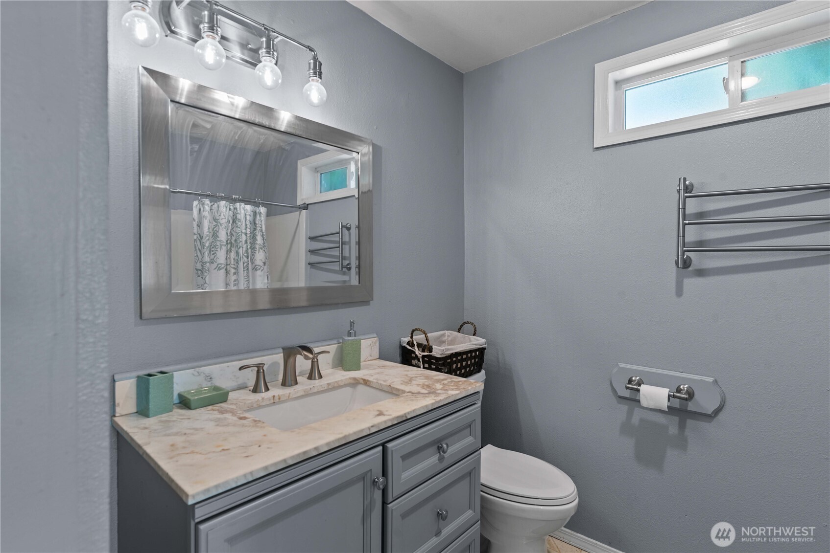 22 South Emerson Avenue Wenatchee, WA 98801 - Photo 36 of 38 a bathroom with a granite countertop sink a toilet and mirror