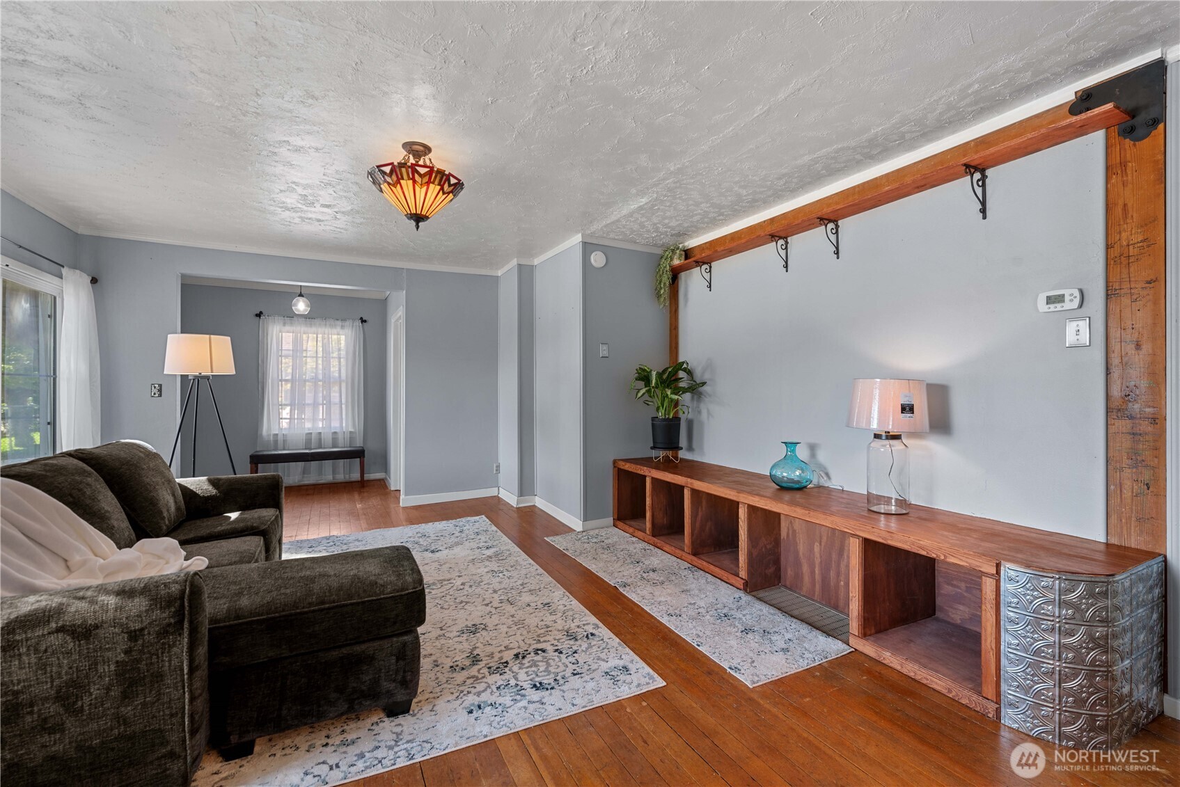 22 South Emerson Avenue Wenatchee, WA 98801 - Photo 4 of 38 a living room with furniture and wooden floor
