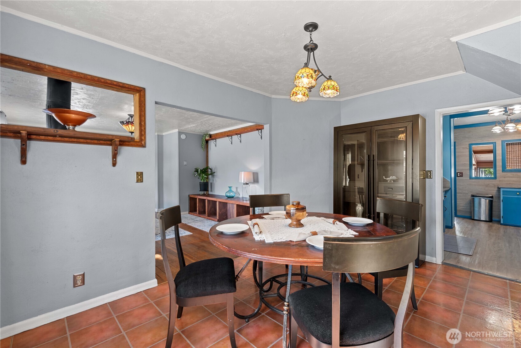 22 South Emerson Avenue Wenatchee, WA 98801 - Photo 7 of 38 a dining room with furniture potted plants and wooden floor