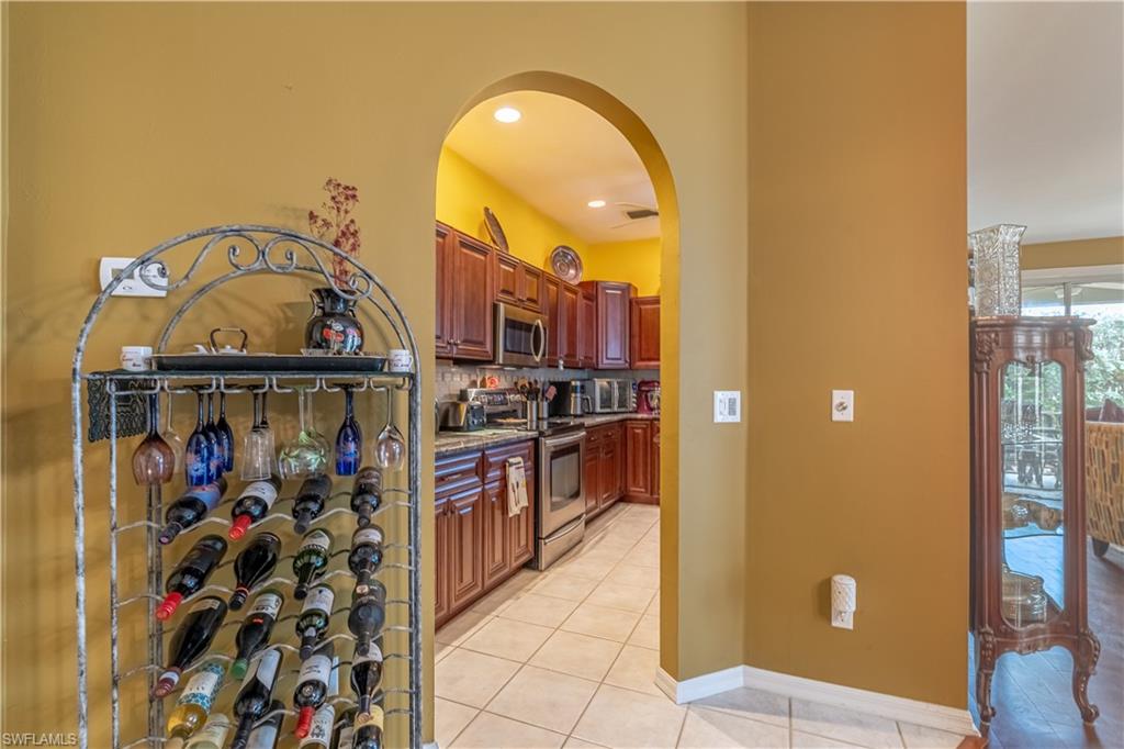431 Crossfield Circle, Unit 77 Naples, FL 34104 - Photo 12 of 33 a view of a storage & utility room