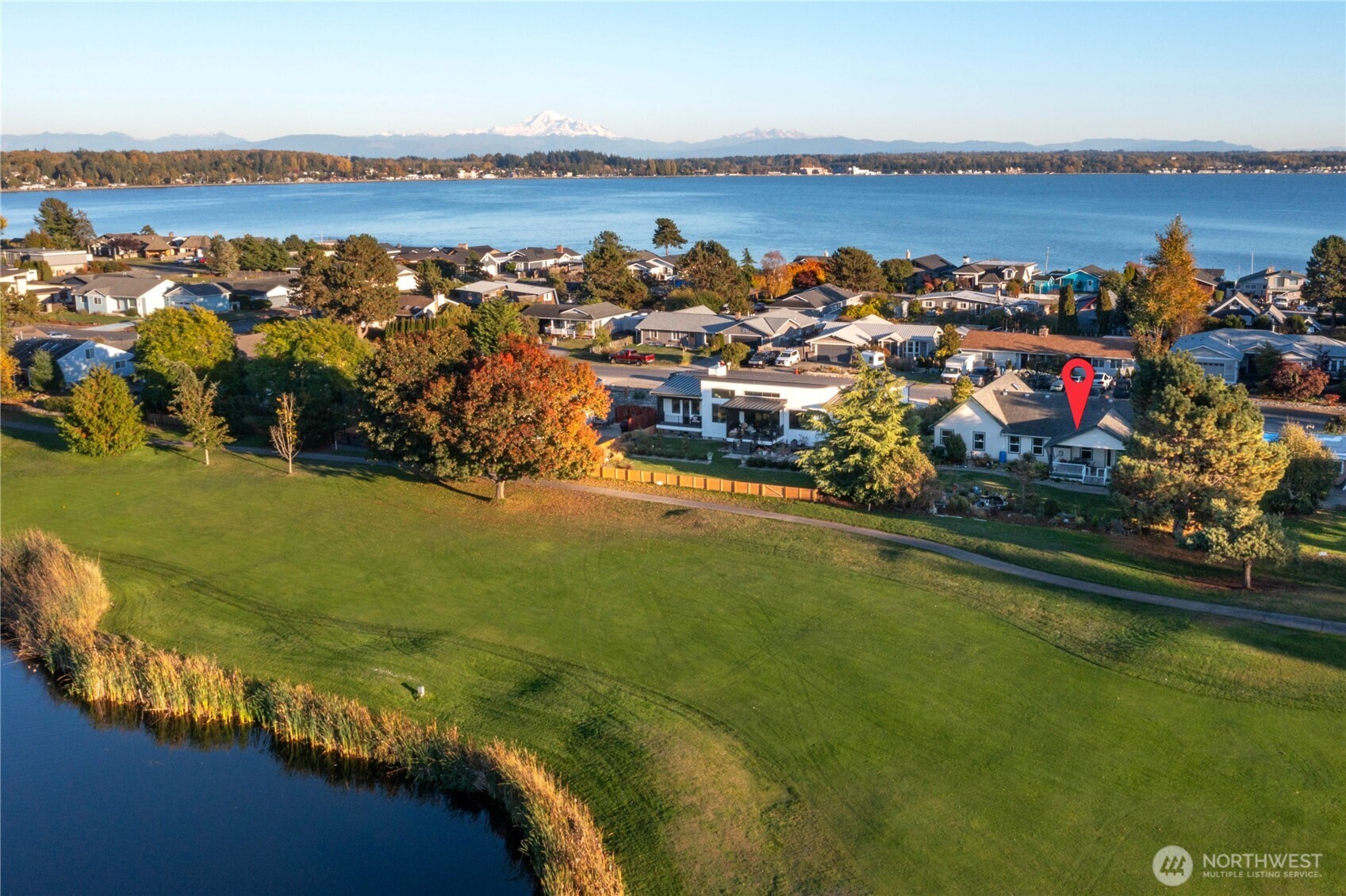 8137 Cowichan Road Blaine, WA 98230 - Photo 1 of 40 an aerial view of a house with a ocean view