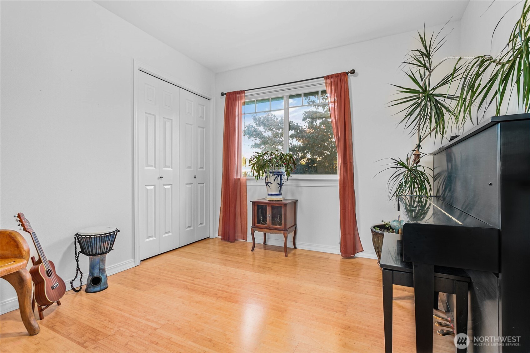 8137 Cowichan Road Blaine, WA 98230 - Photo 13 of 40 a bedroom with furniture and a window