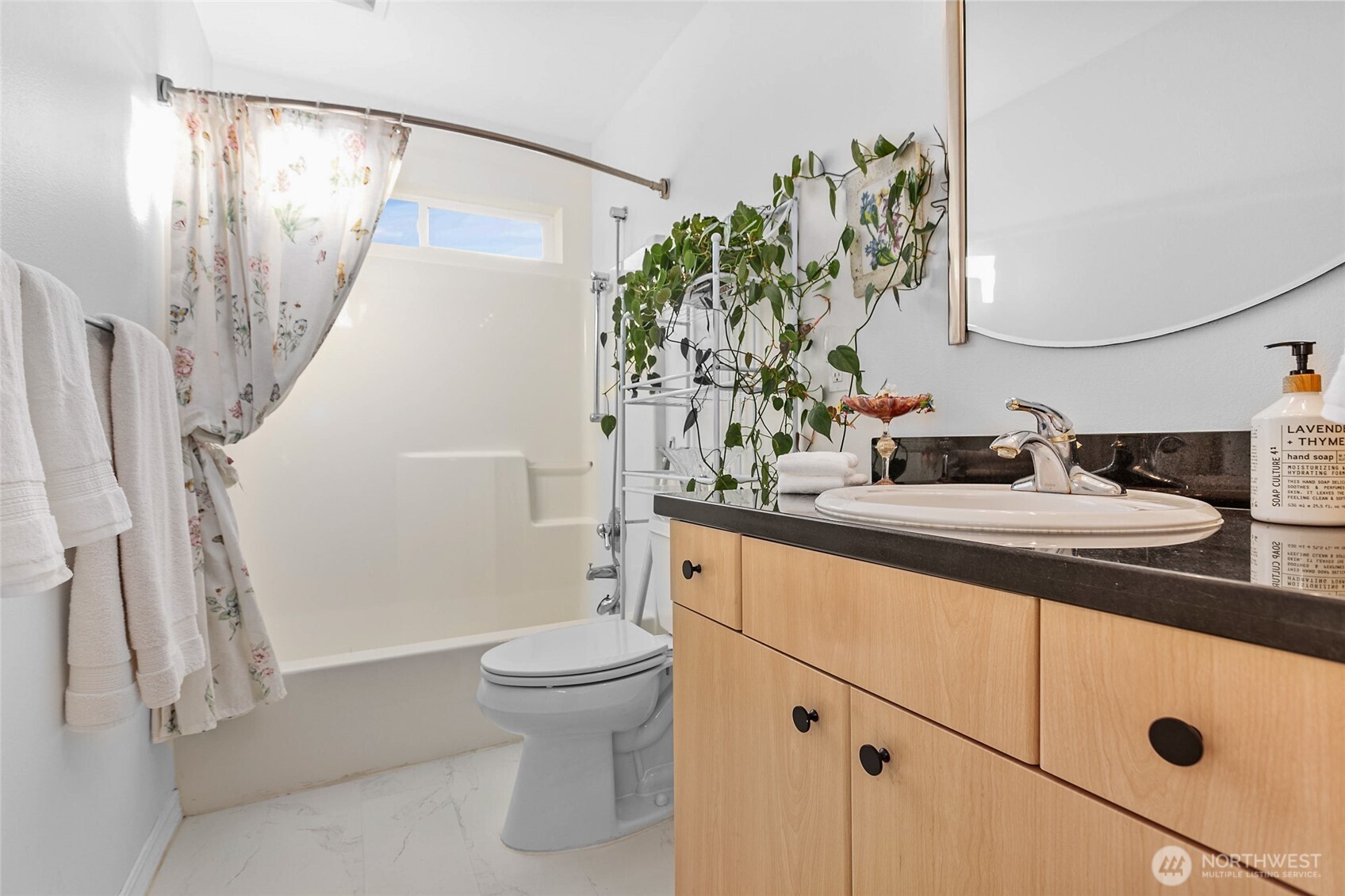 8137 Cowichan Road Blaine, WA 98230 - Photo 14 of 40 a bathroom with a sink a toilet and shower