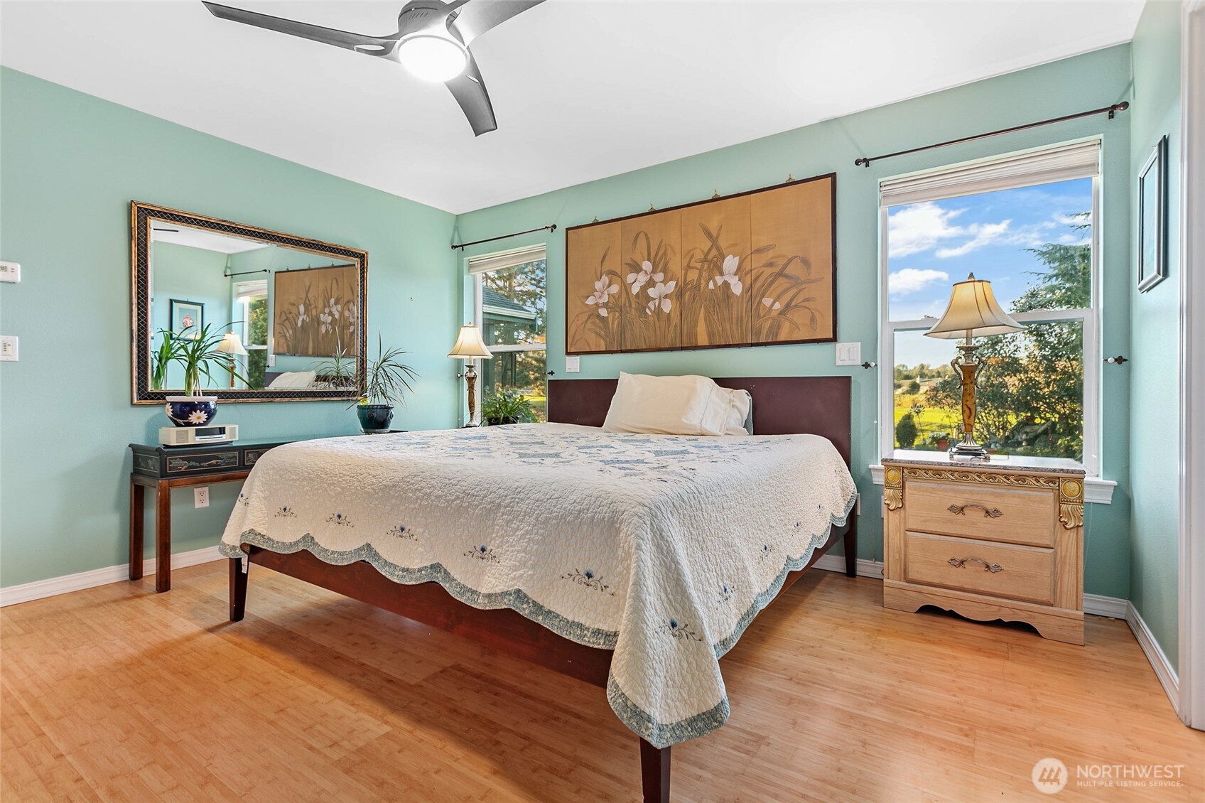 8137 Cowichan Road Blaine, WA 98230 - Photo 19 of 40 a bed sitting in a bedroom next to a window