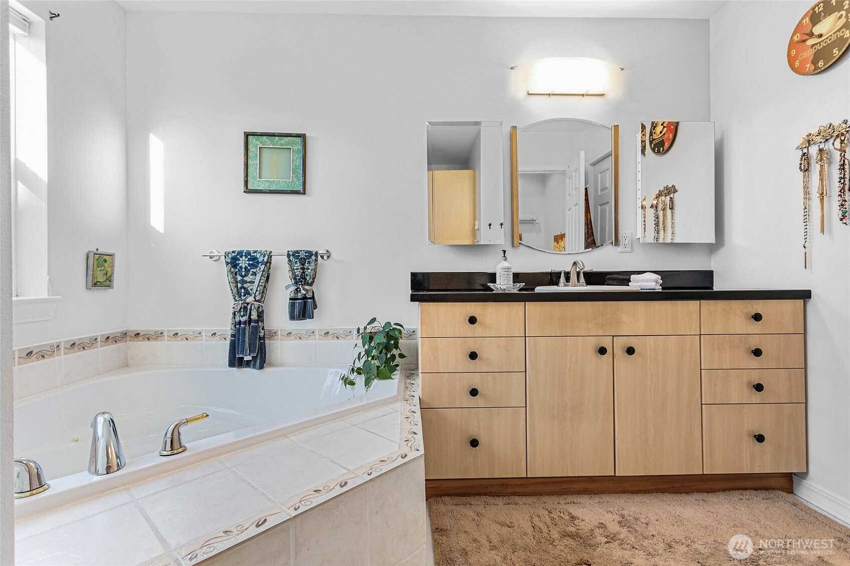 8137 Cowichan Road Blaine, WA 98230 - Photo 20 of 40 a bathroom with a sink vanity and mirror