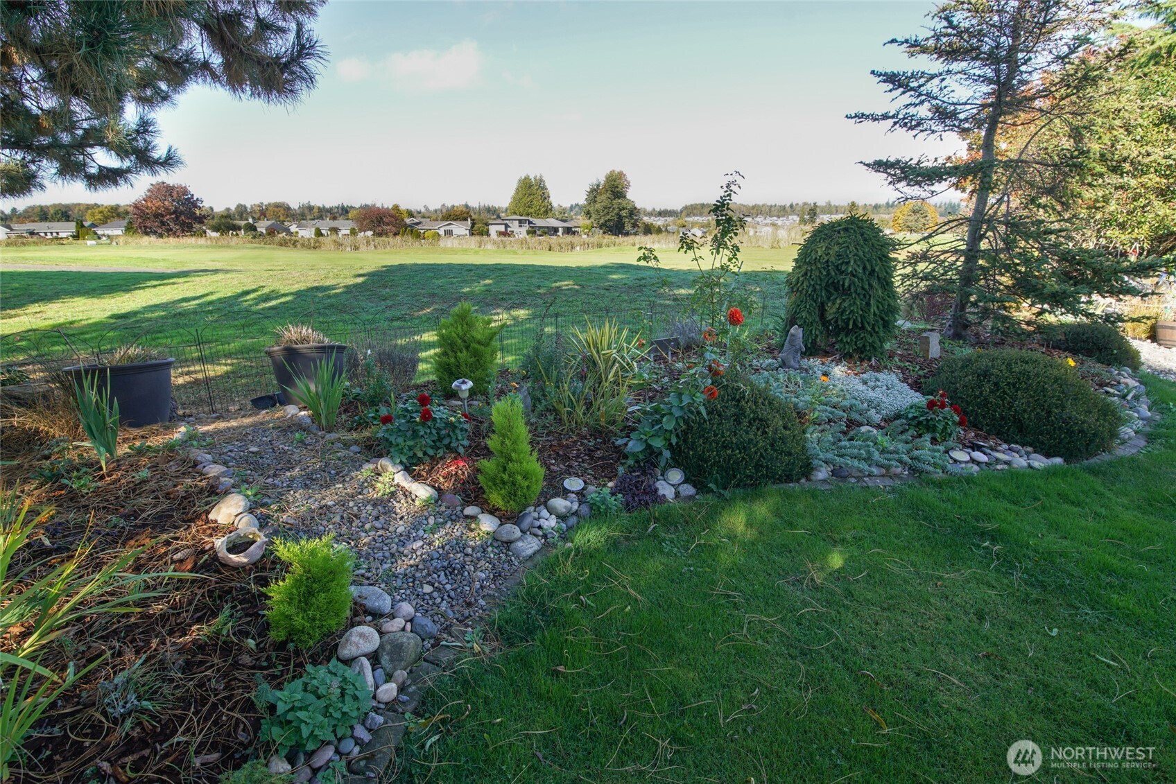 8137 Cowichan Road Blaine, WA 98230 - Photo 28 of 40 a view of a garden with houses