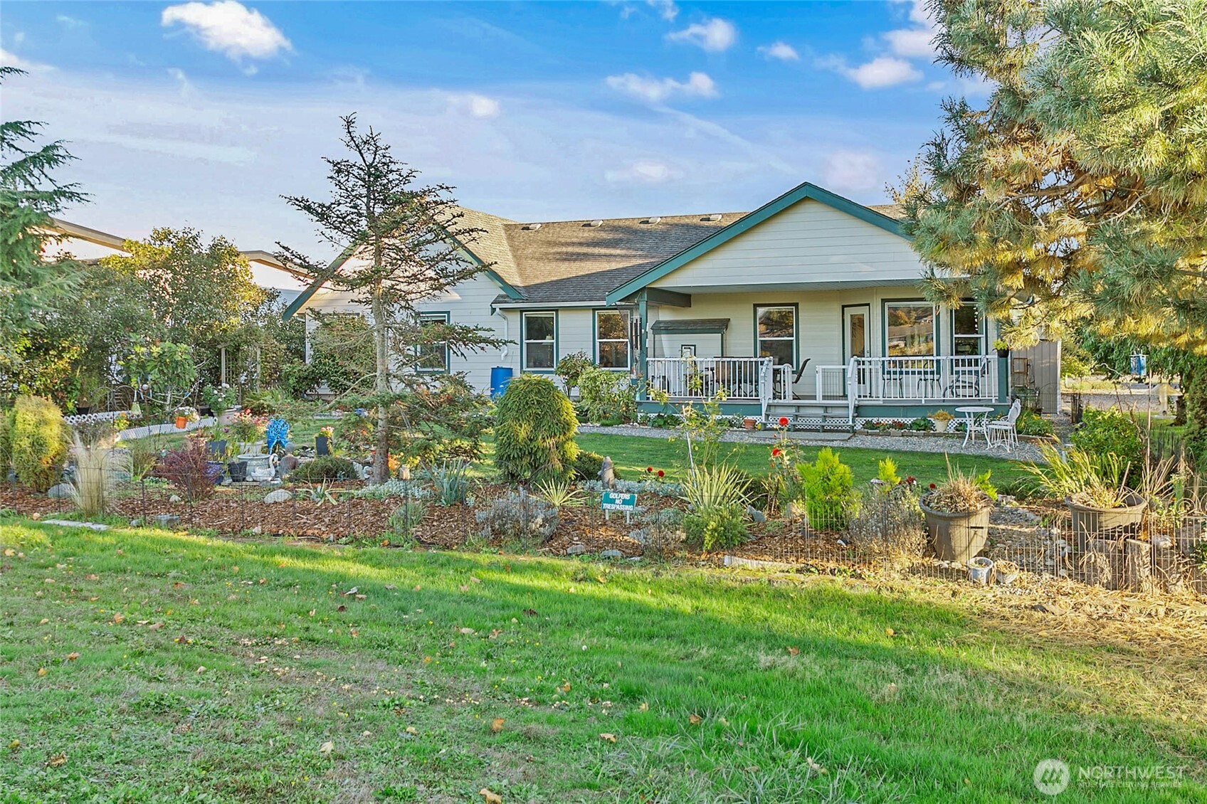 8137 Cowichan Road Blaine, WA 98230 - Photo 29 of 40 a front view of a house with a yard