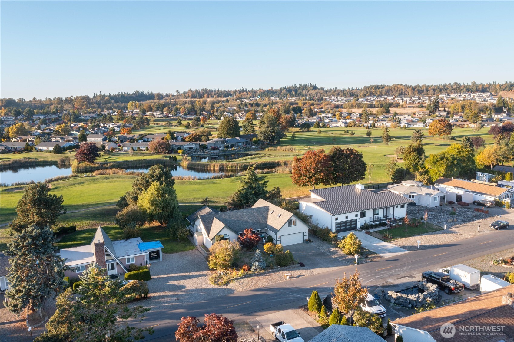 8137 Cowichan Road Blaine, WA 98230 - Photo 31 of 40 an aerial view of a houses with a lake