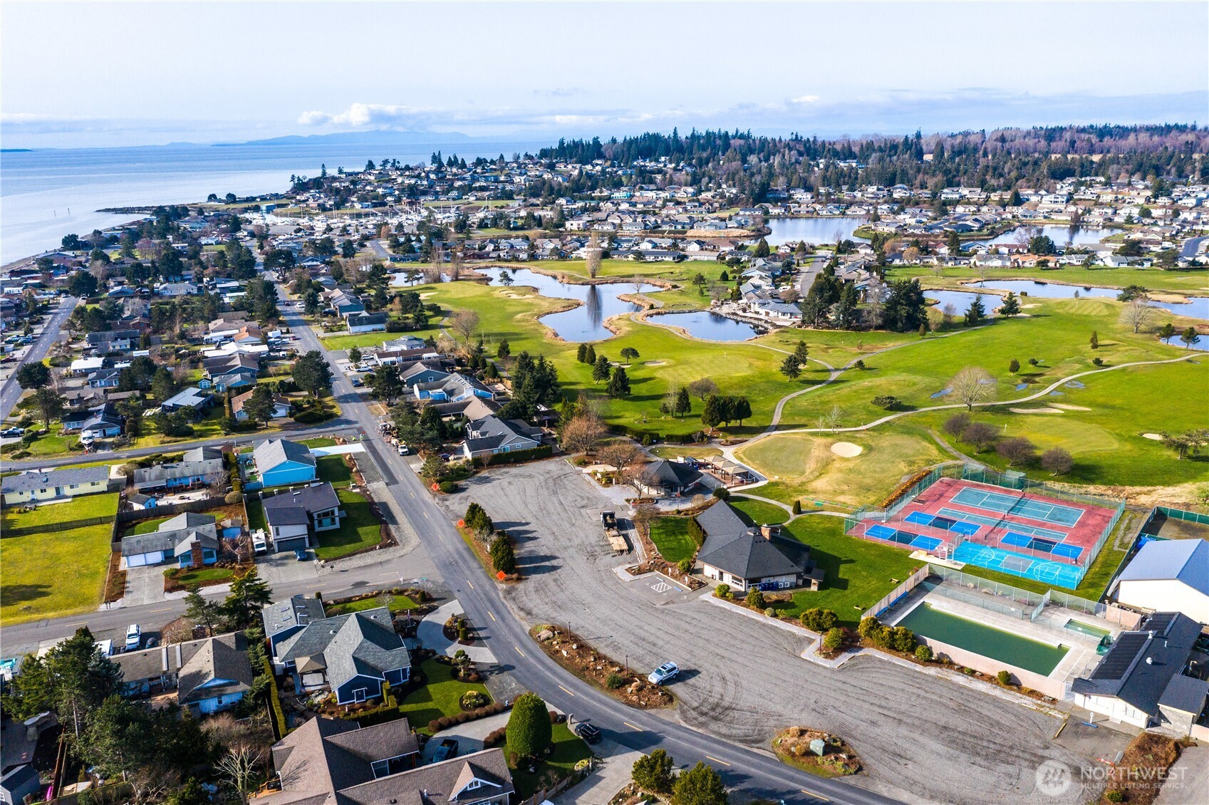 8137 Cowichan Road Blaine, WA 98230 - Photo 35 of 40 an aerial view of residential houses with outdoor space