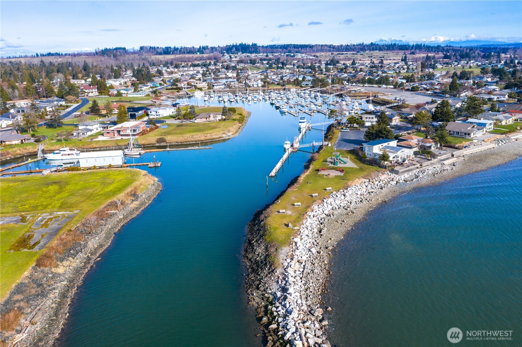 8137 Cowichan Road Blaine, WA 98230 - Photo 37 of 40 a view of a city with an ocean