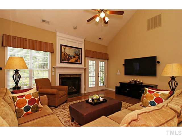 4604 Zaldivar Way Raleigh, NC 27612 - Photo 6 of 23 The living room has a vaulted ceiling and lots of windows for an open space, but a great fireplace for cozy nights. Living Room