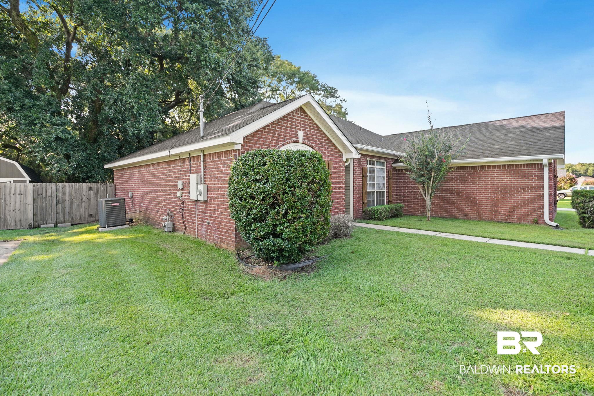10550 Patrick Avenue Grand Bay, AL 36541 - Photo 4 of 43 View of front of house featuring central air condition unit and a front lawn