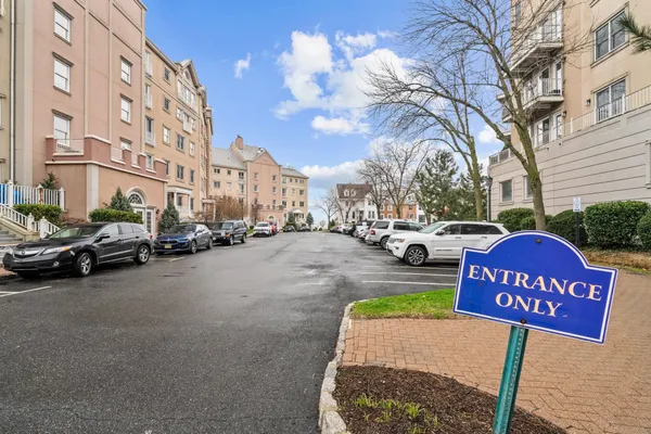 a view of a street with cars