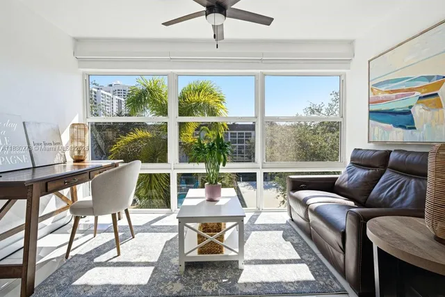 a bedroom with a large bed and a dresser