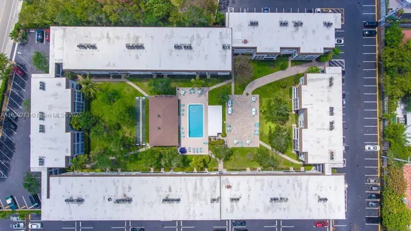 an aerial view of a house with a garden