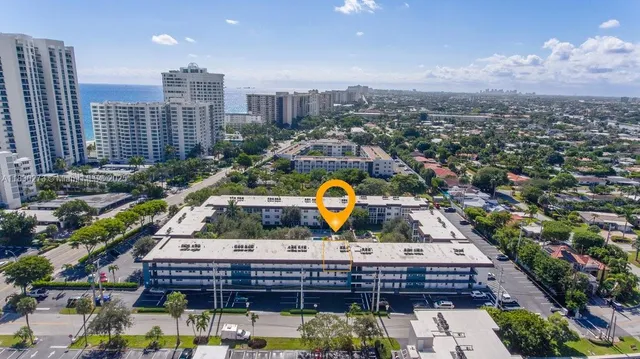 a view of city and a tall buildings