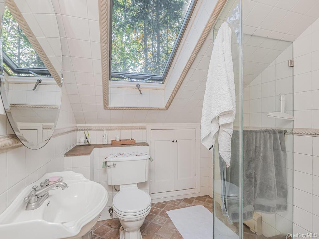 105 Douglas Road Chappaqua, NY 10514 - Photo 21 of 33 Full bath with tile walls and a stall shower