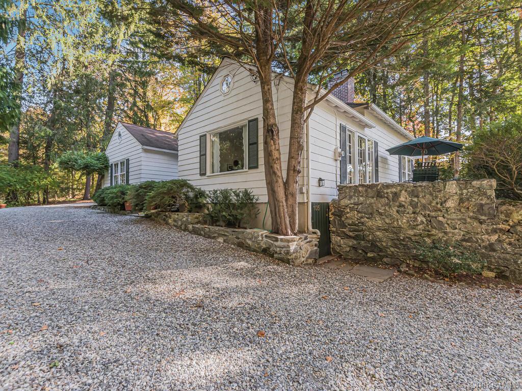 105 Douglas Road Chappaqua, NY 10514 - Photo 27 of 33 View of side of property with a chimney