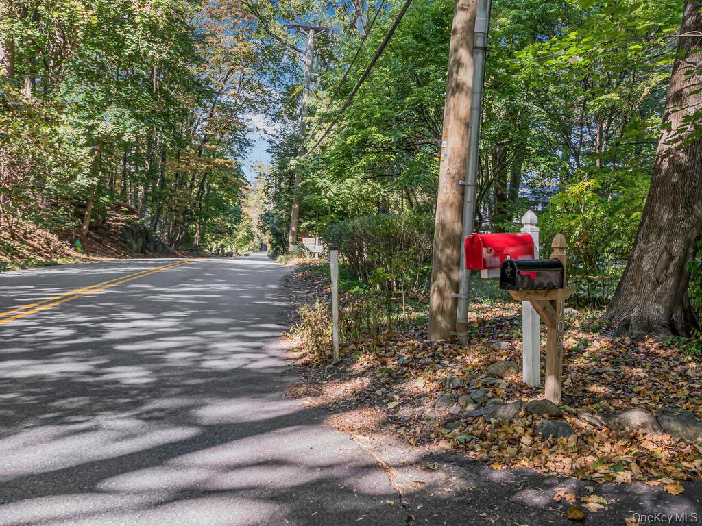 105 Douglas Road Chappaqua, NY 10514 - Photo 33 of 33 View of asphalt street and driveway entrance to property.
