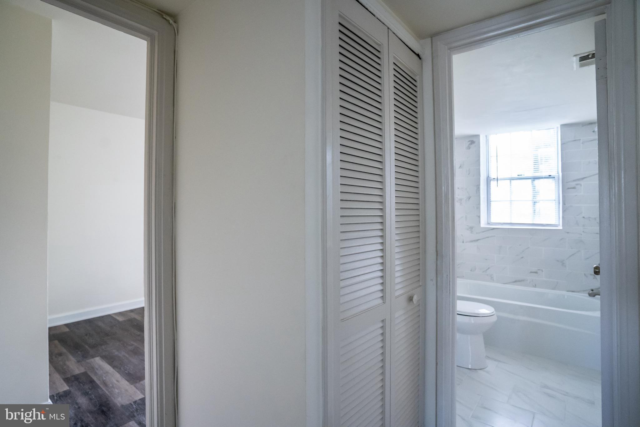4814 30th Street South, Unit B1 Arlington, VA 22206 - Photo 11 of 18 a bathroom with a granite countertop sink