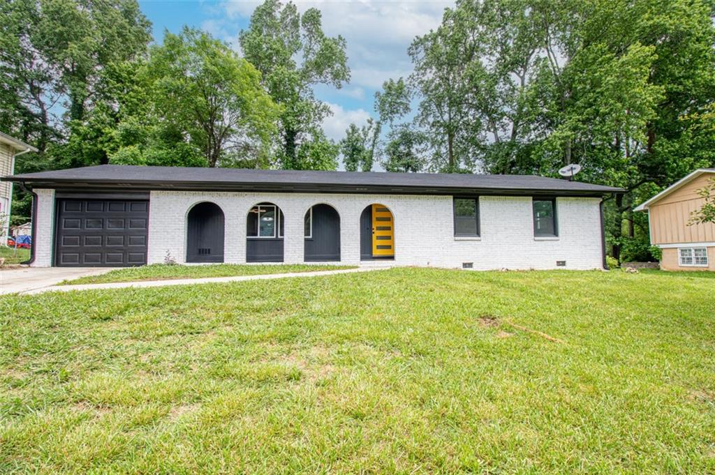 3888 Emerald N Drive Decatur, GA 30035 - Photo 1 of 1 a view of a house with a backyard