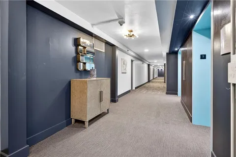 a view of a hallway with entryway