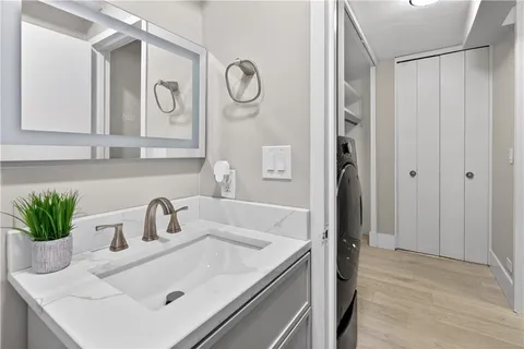 a bathroom with a sink and a mirror