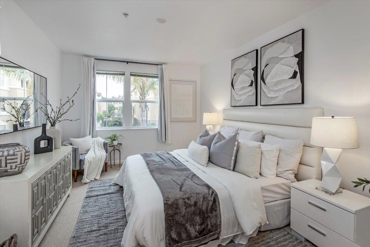 1883 Agnew Road, Unit 341 Santa Clara, CA 95054 - Photo 14 of 38 a bedroom with a bed and a painting on the wall