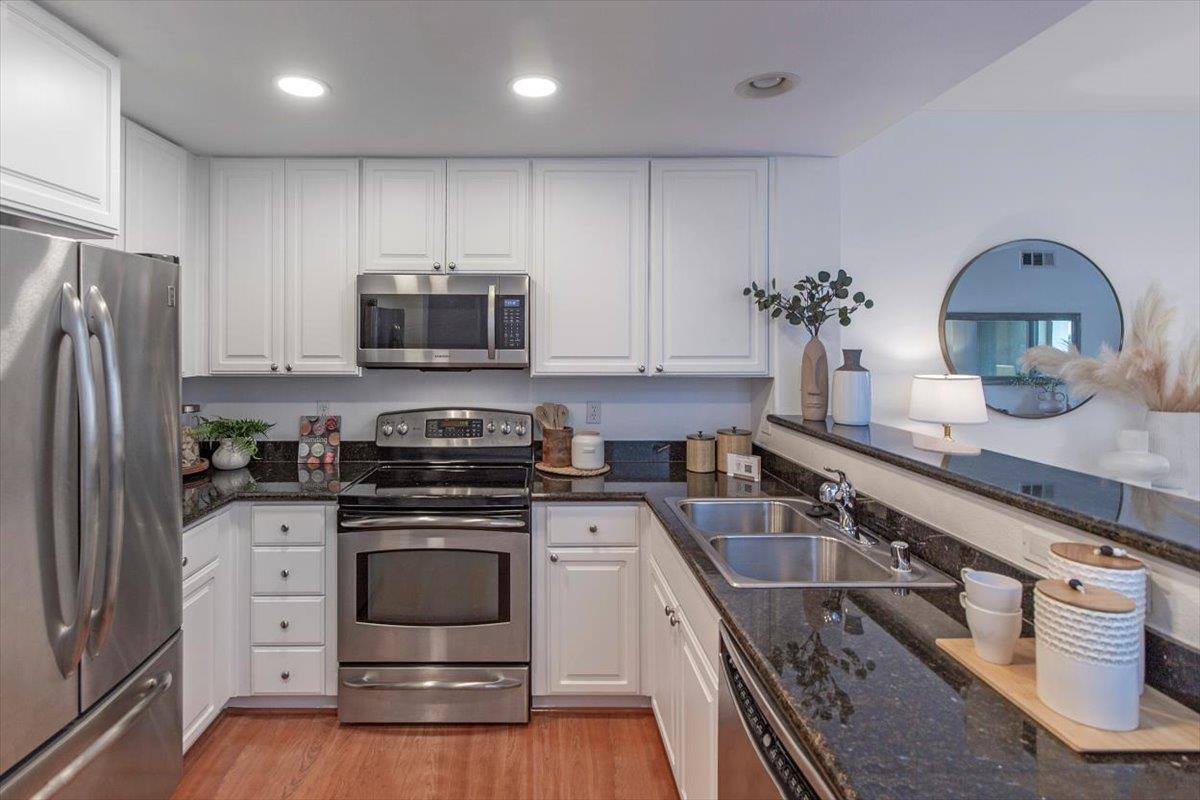 1883 Agnew Road, Unit 341 Santa Clara, CA 95054 - Photo 2 of 38 a kitchen with a stove and a refrigerator