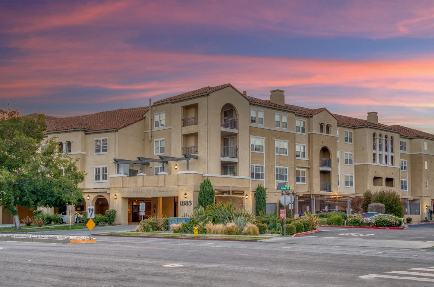 1883 Agnew Road, Unit 341 Santa Clara, CA 95054 - Photo 37 of 38 a front view of a building with a yard