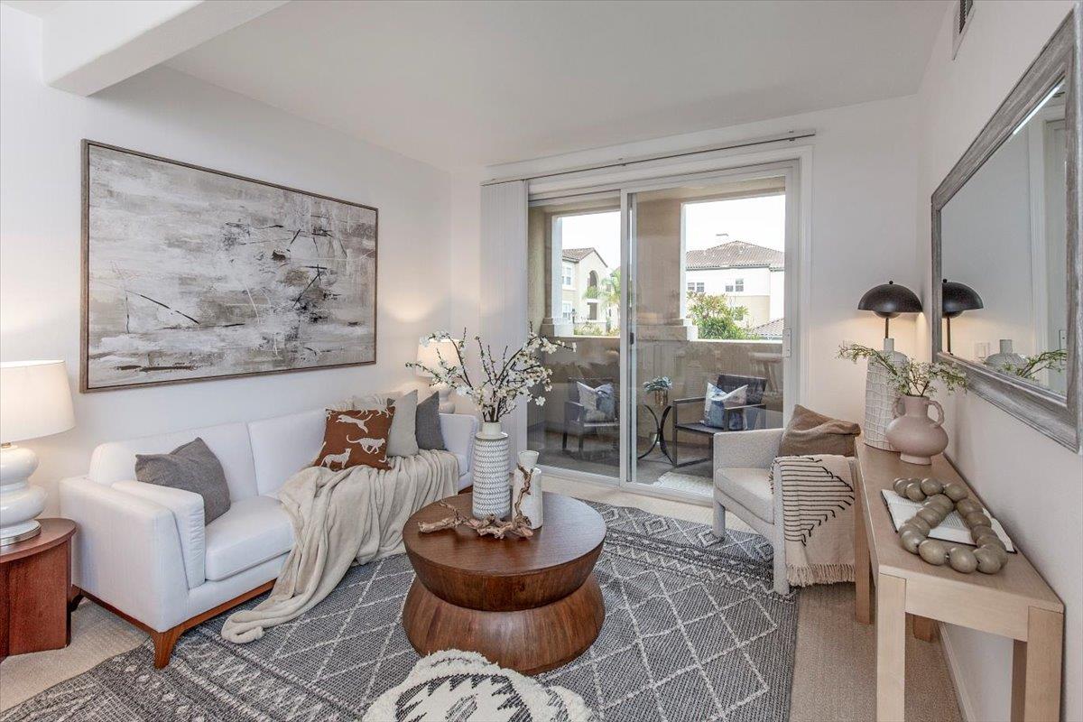 1883 Agnew Road, Unit 341 Santa Clara, CA 95054 - Photo 6 of 38 a living room with furniture and a large window