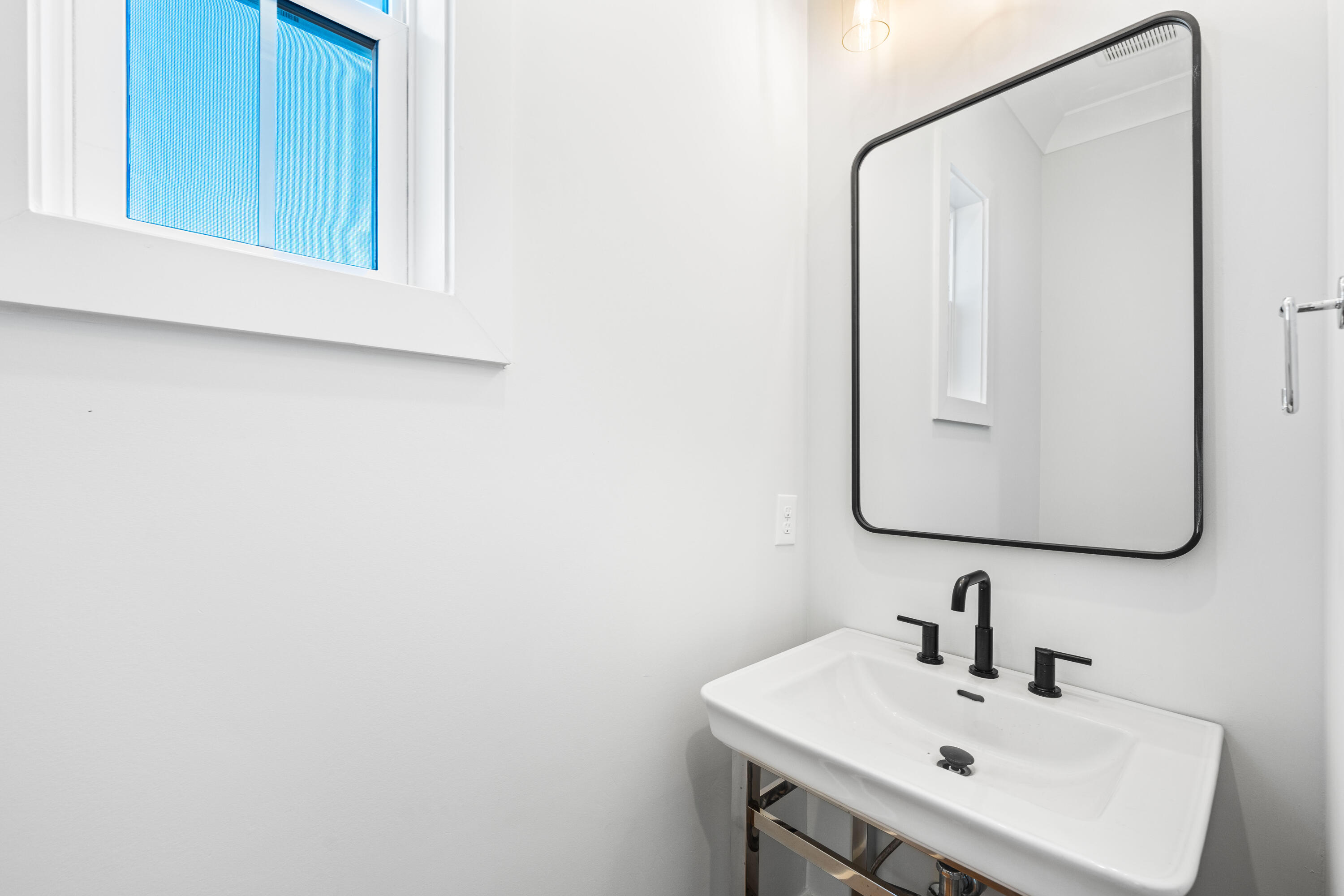 20 Casa Breeze Lane, Unit 20B Santa Rosa Beach, FL 32459 - Photo 11 of 41 a bathroom with a sink and a mirror