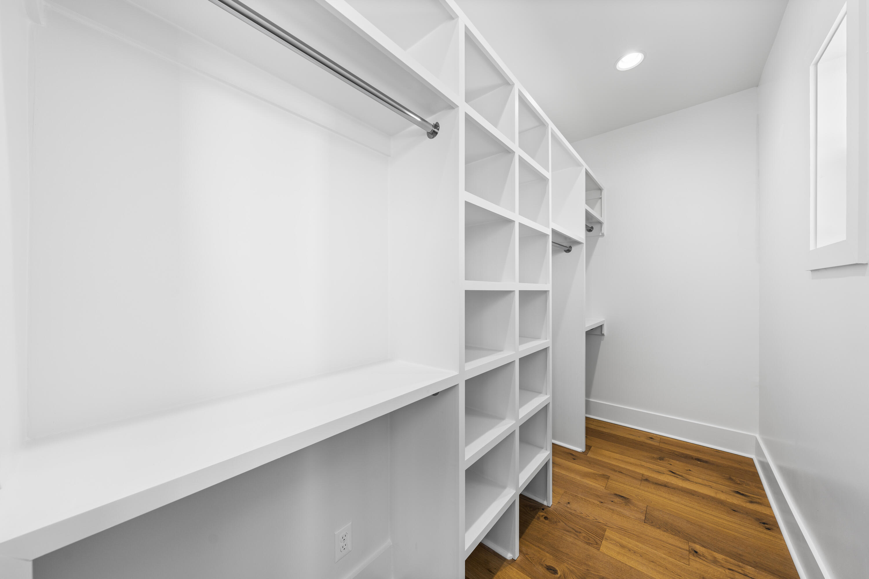 20 Casa Breeze Lane, Unit 20B Santa Rosa Beach, FL 32459 - Photo 24 of 41 a view of walk in closet with empty racks