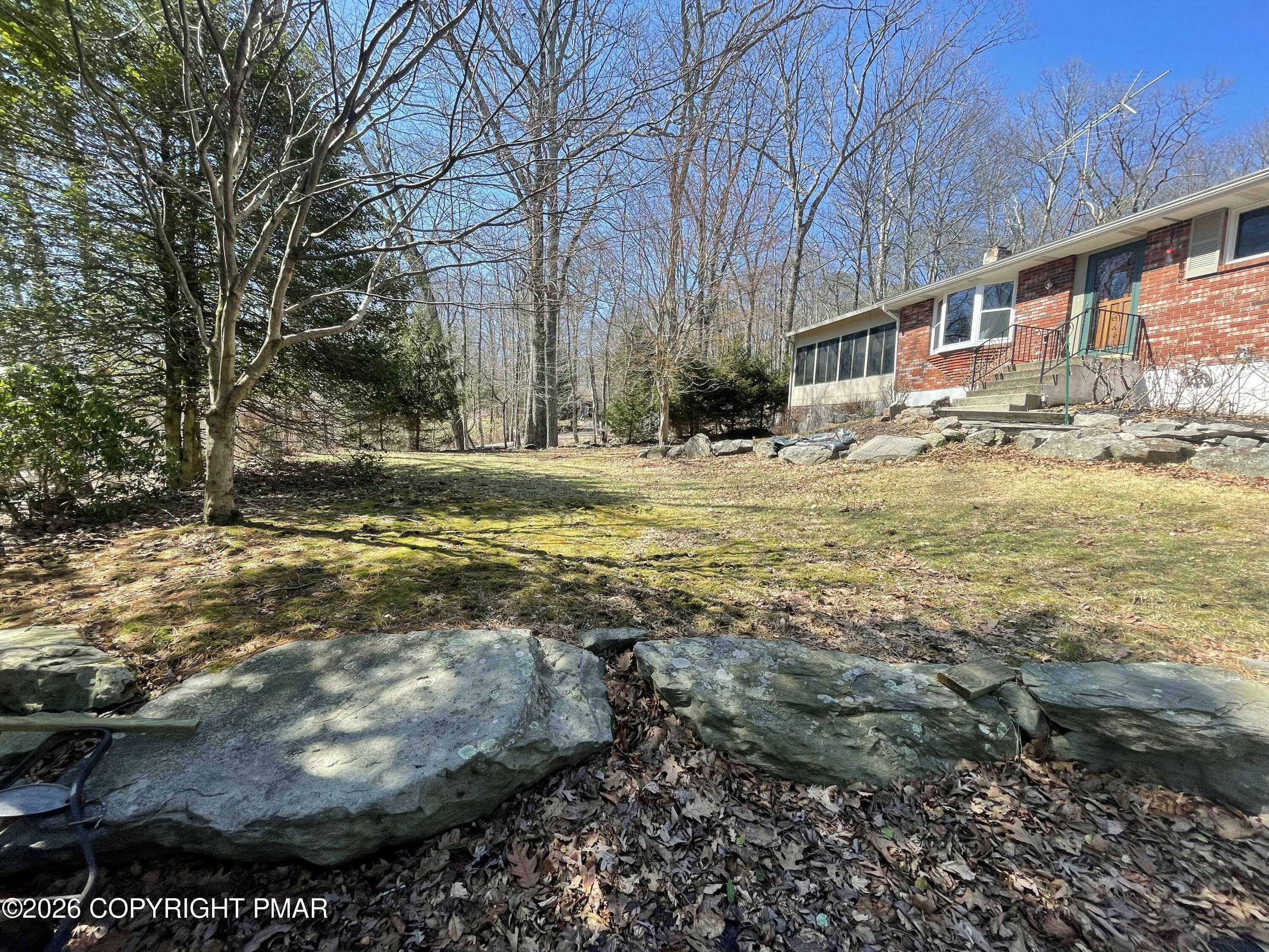 2319 Bear Town Road Canadensis, PA 18325 - Photo 4 of 31 a view of a backyard with large trees