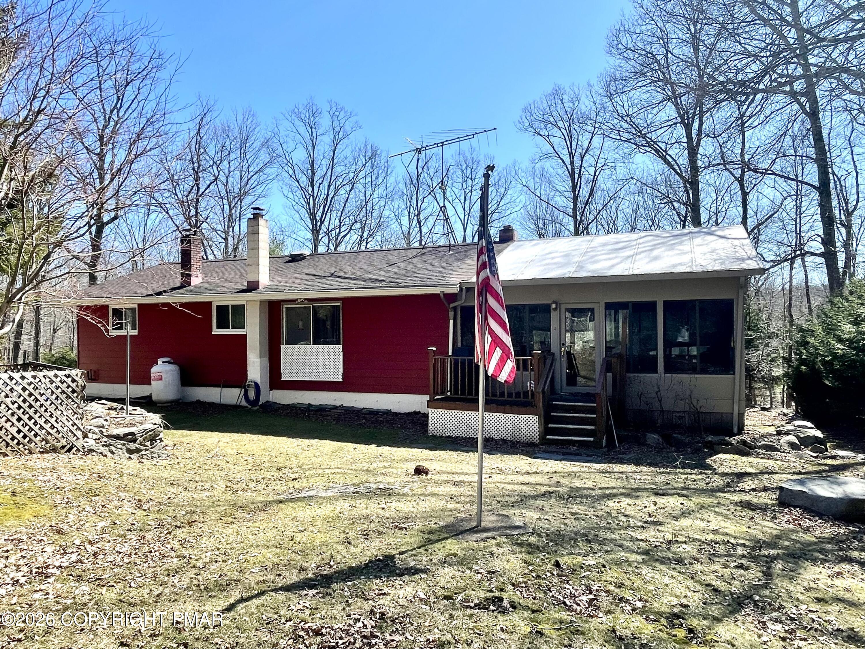 2319 Bear Town Road Canadensis, PA 18325 - Photo 5 of 31 a view of a house with a yard covered in snow