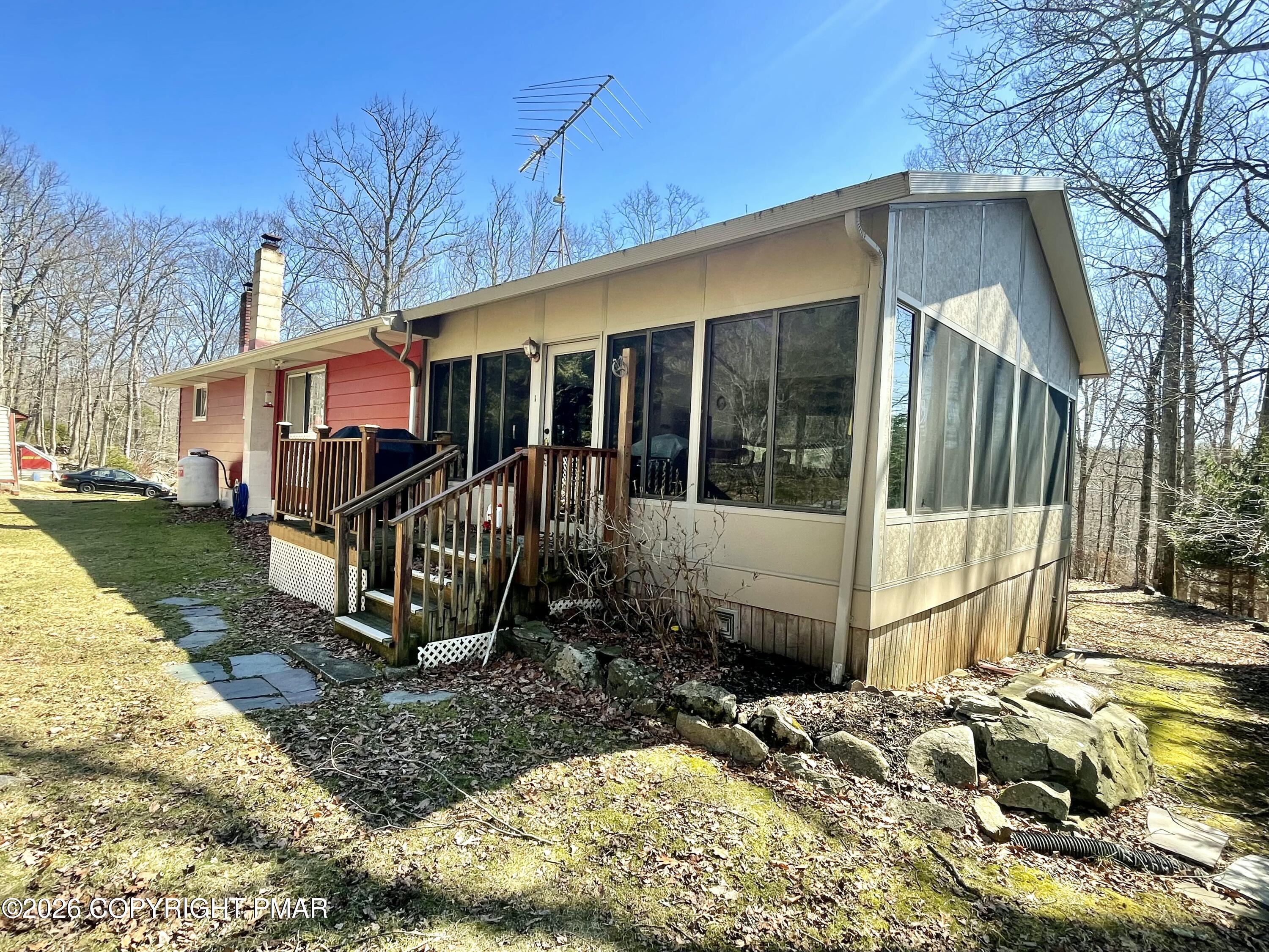 2319 Bear Town Road Canadensis, PA 18325 - Photo 6 of 31 a view of a house with a yard covered in snow