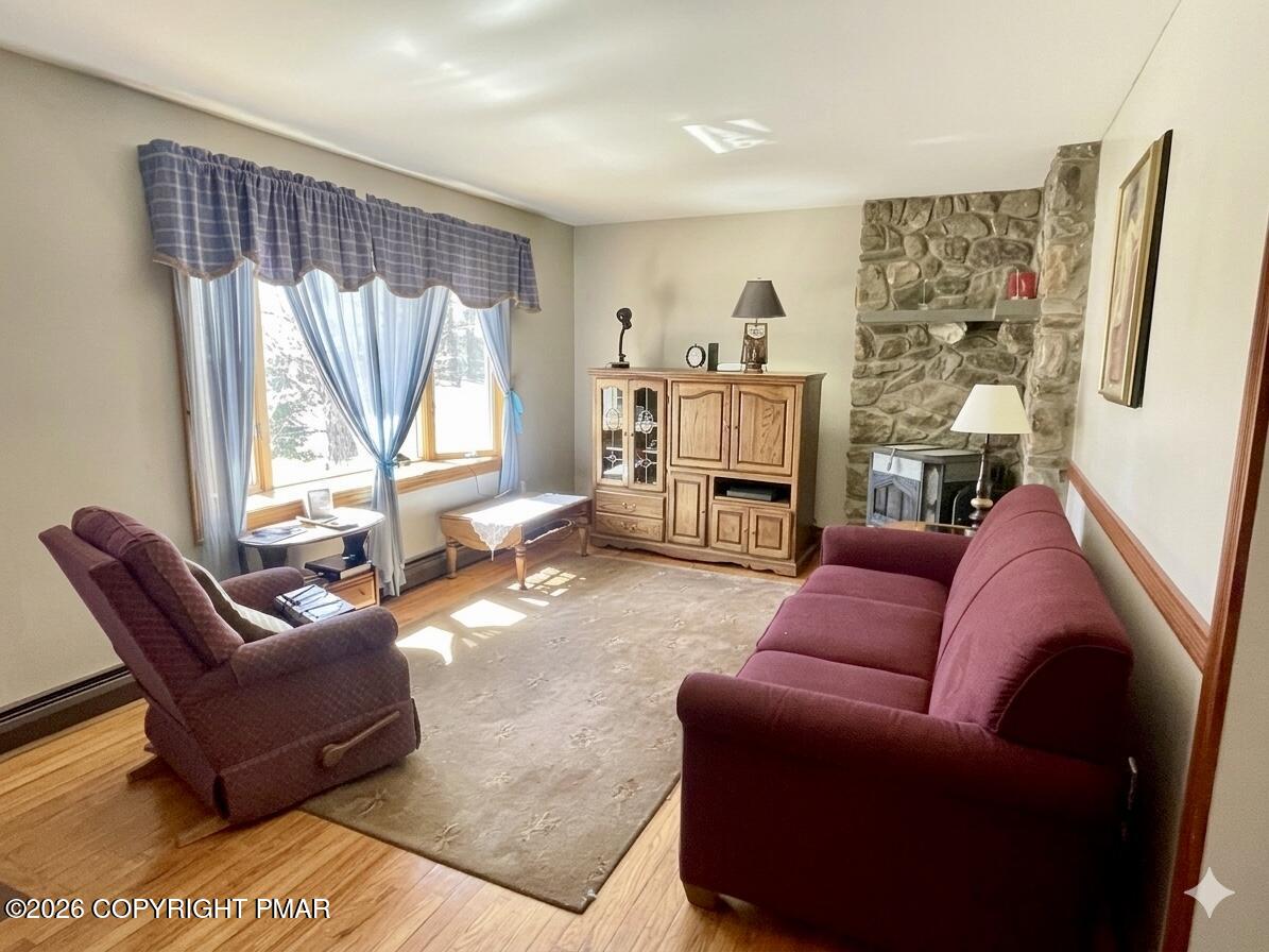 2319 Bear Town Road Canadensis, PA 18325 - Photo 7 of 31 a living room with furniture and a large window