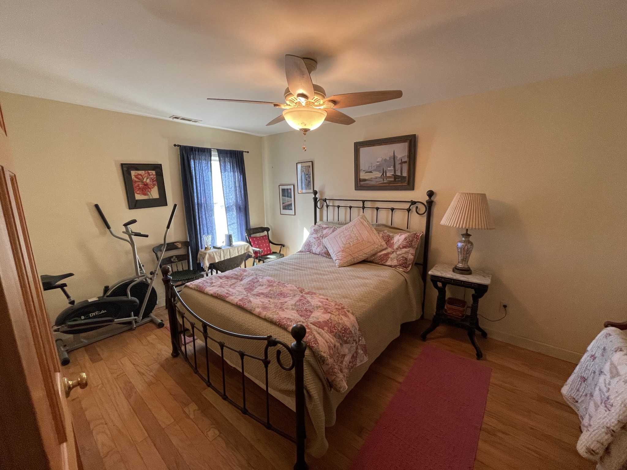 505 Dog Branch Road Prospect, TN 38477 - Photo 53 of 54 a bedroom with a bed and a chandelier