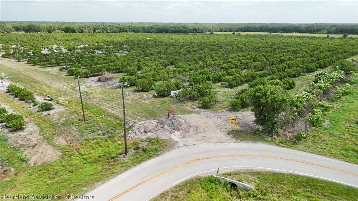 Crewsville Road Zolfo Springs, FL 33890 - Photo 8 of 34 a view of a lake with a yard