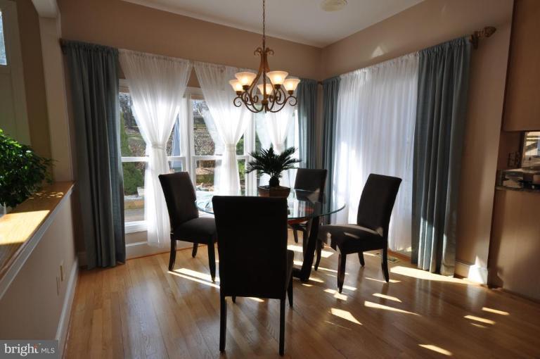 1214 Tottenham Court Reston, VA 20194 - Photo 3 of 13 a view of a dining room with furniture window and outside view