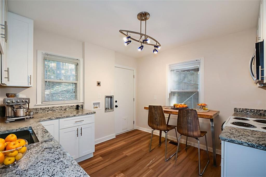 554 Alpine Way Marietta, GA 30062 - Photo 14 of 27 a view of a workspace with furniture and a window