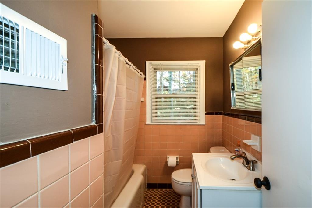 554 Alpine Way Marietta, GA 30062 - Photo 21 of 27 a bathroom with a sink toilet and shower