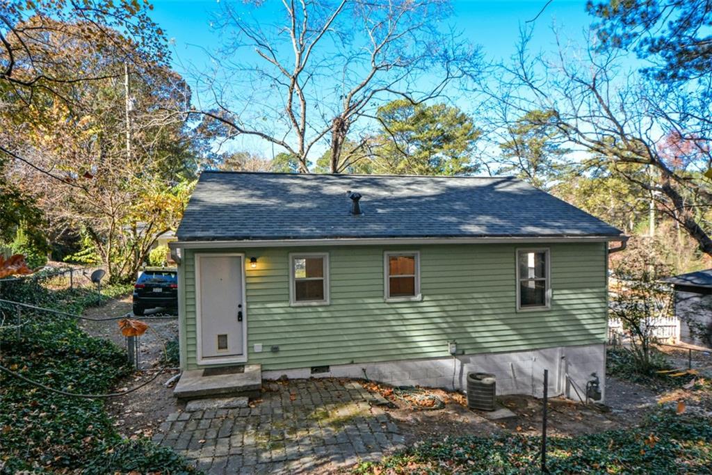 554 Alpine Way Marietta, GA 30062 - Photo 23 of 27 a view of a house with a yard
