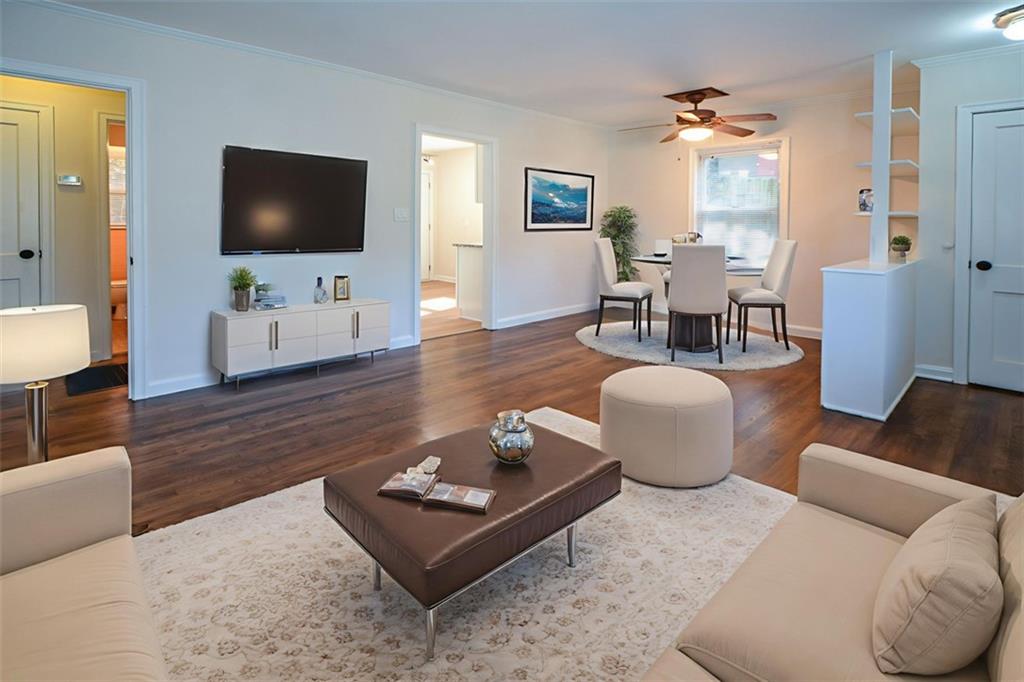 554 Alpine Way Marietta, GA 30062 - Photo 4 of 27 a living room with furniture and a flat screen tv