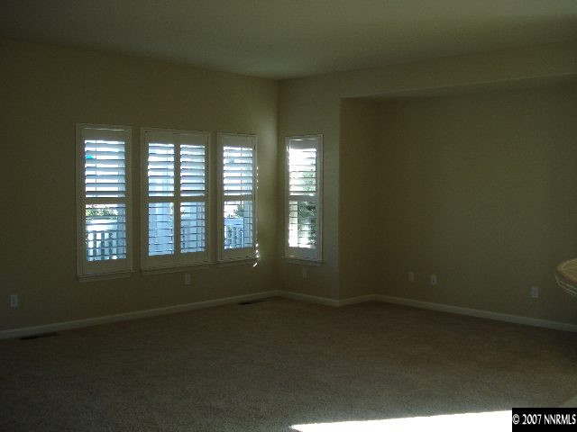 3290 Paragon Place Reno, NV 89509 - Photo 2 of 8 an empty room with a window