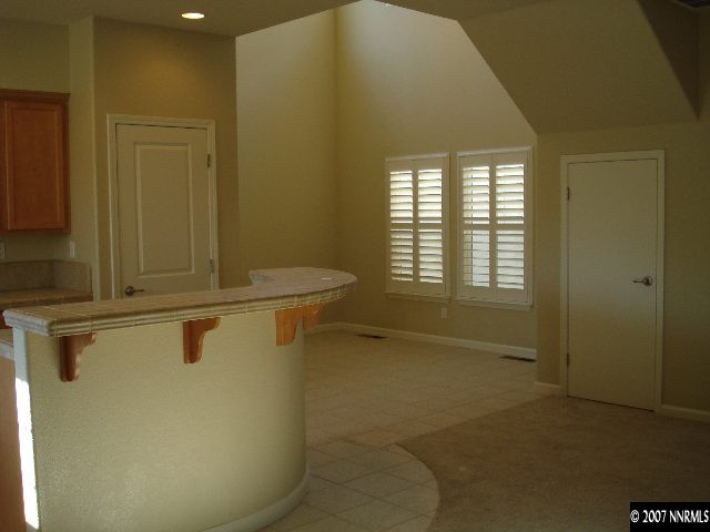 3290 Paragon Place Reno, NV 89509 - Photo 5 of 8 a view of a livingroom with furniture and a window