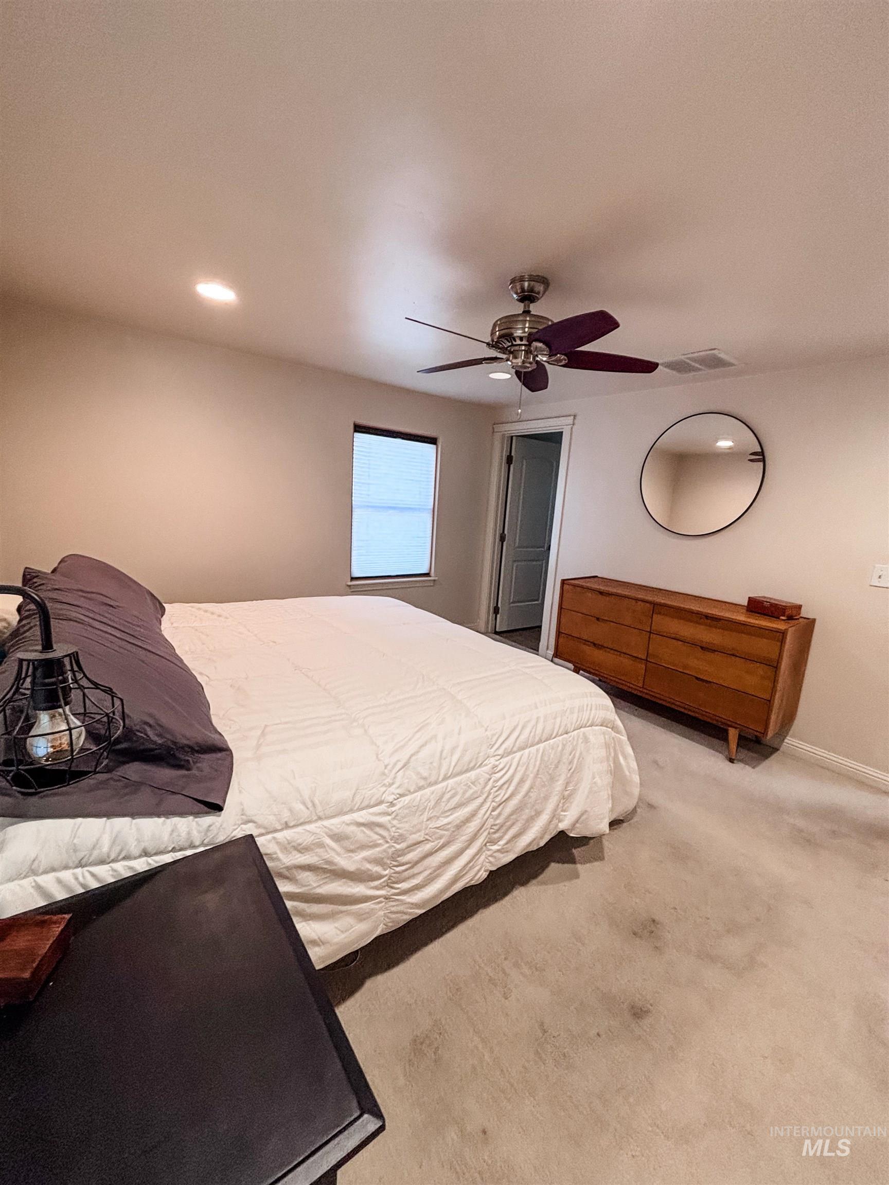 743 North Horseshoe Bend Road Eagle, ID 83616 - Photo 15 of 27 Bedroom featuring carpet flooring, ceiling fan, and recessed lighting